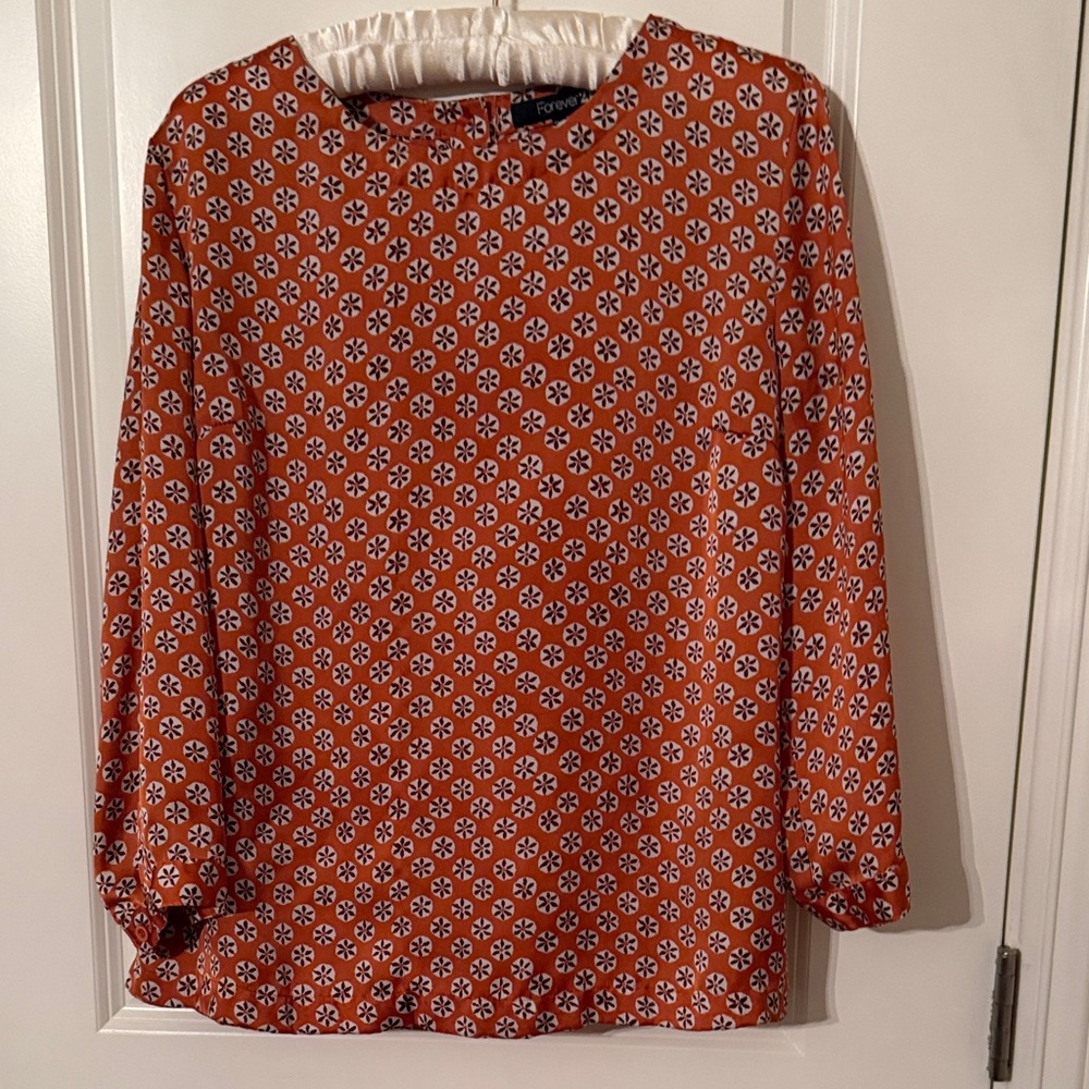 Forever 21 Pumpkin colored geometric Blouse